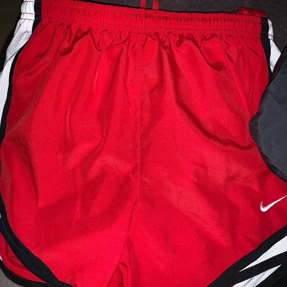 Red nike shorts